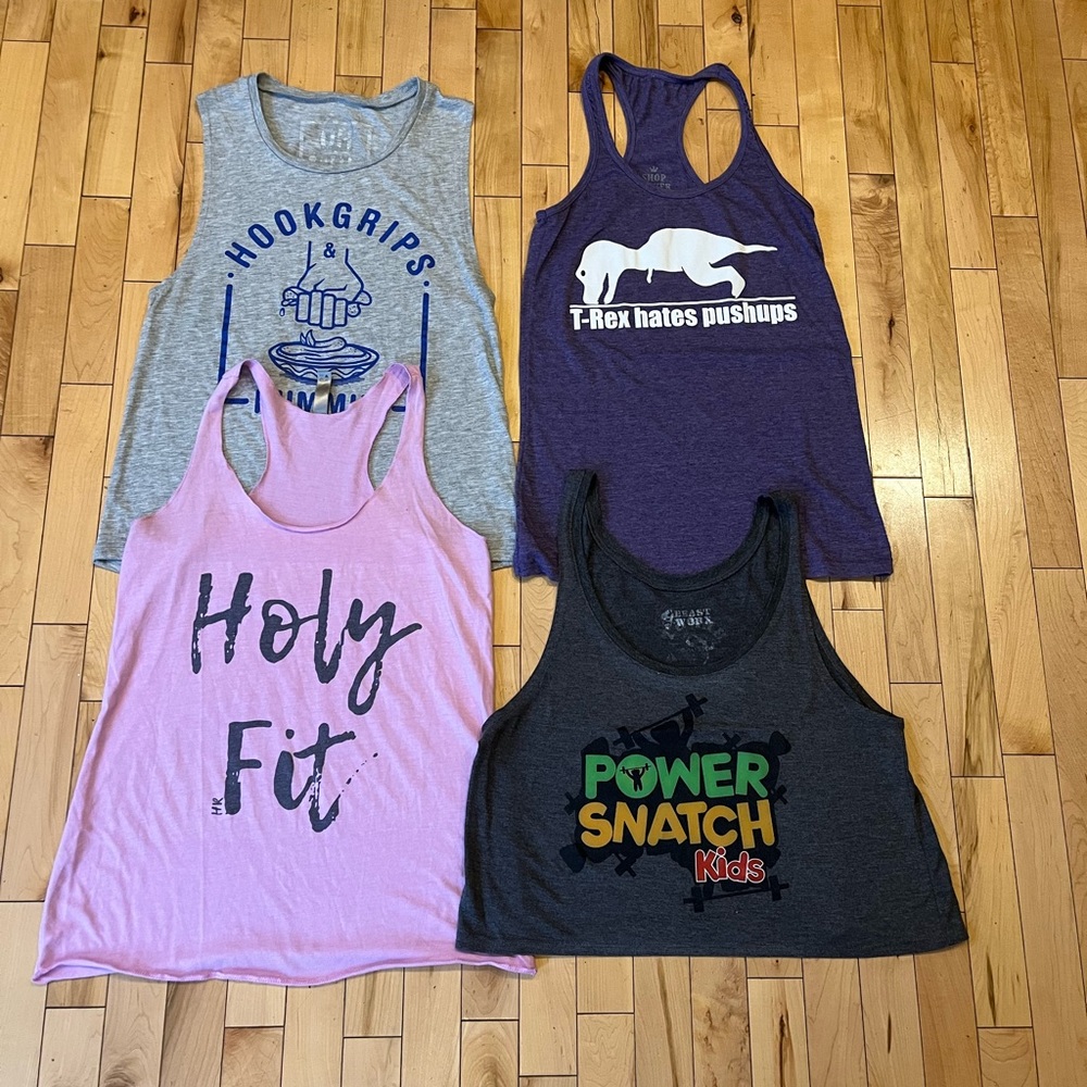 Bundle of 4 Graphic tanks. Size M
